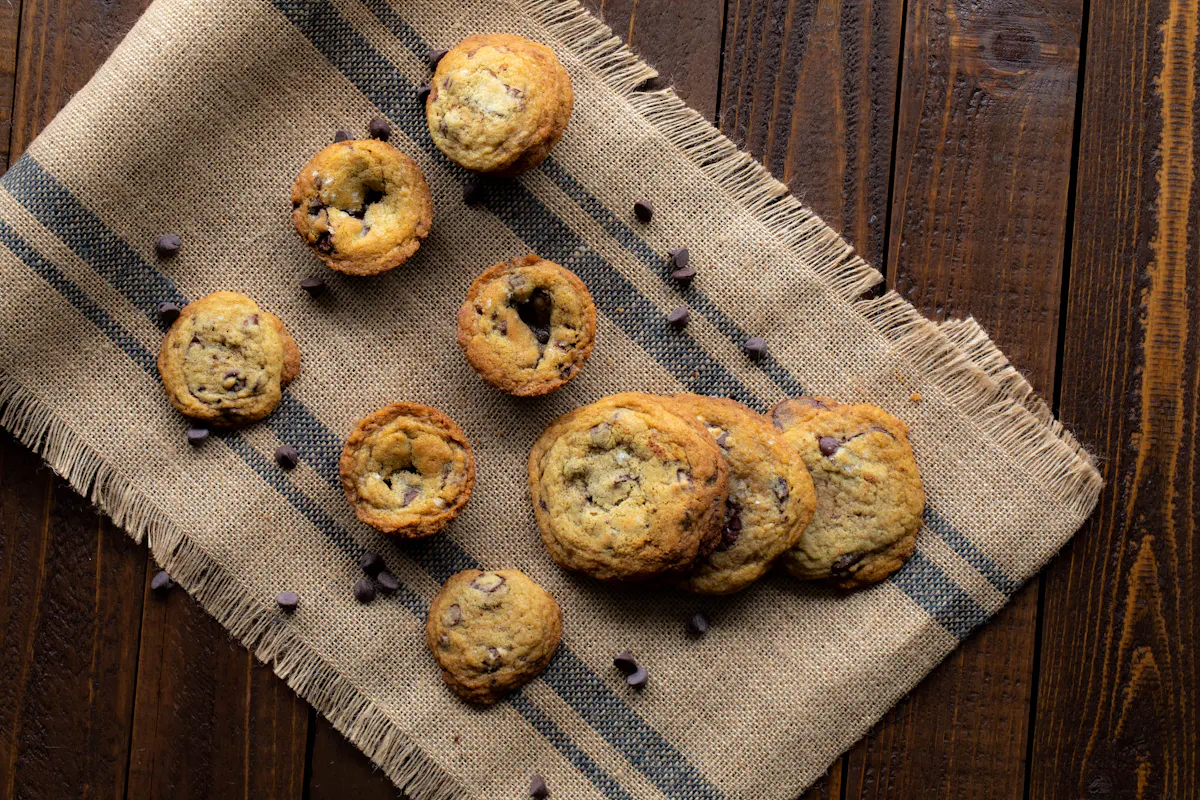a row of bread on a wooden surface