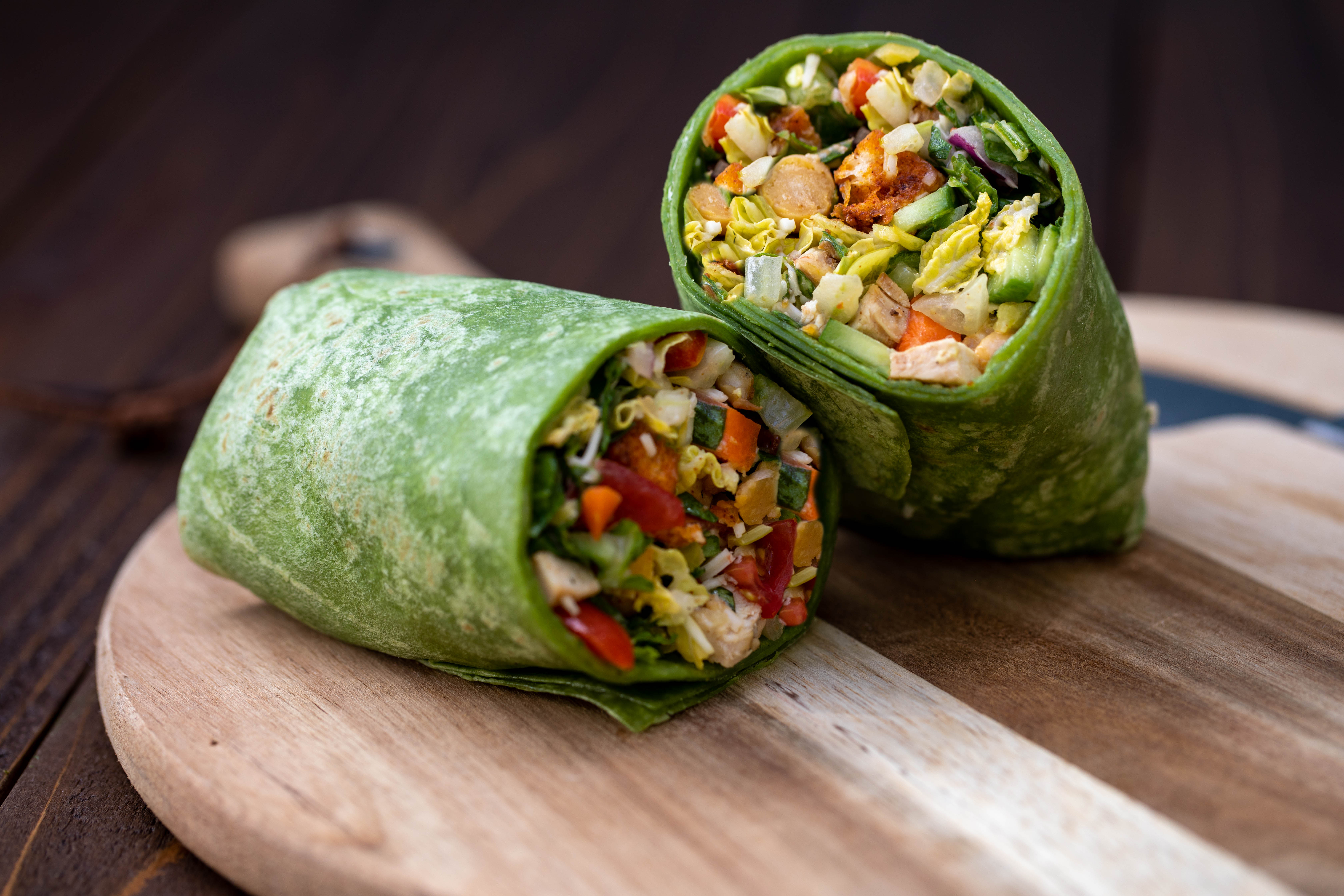 a close up of food on a wooden cutting board