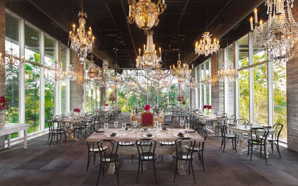 a dining room table in front of a building