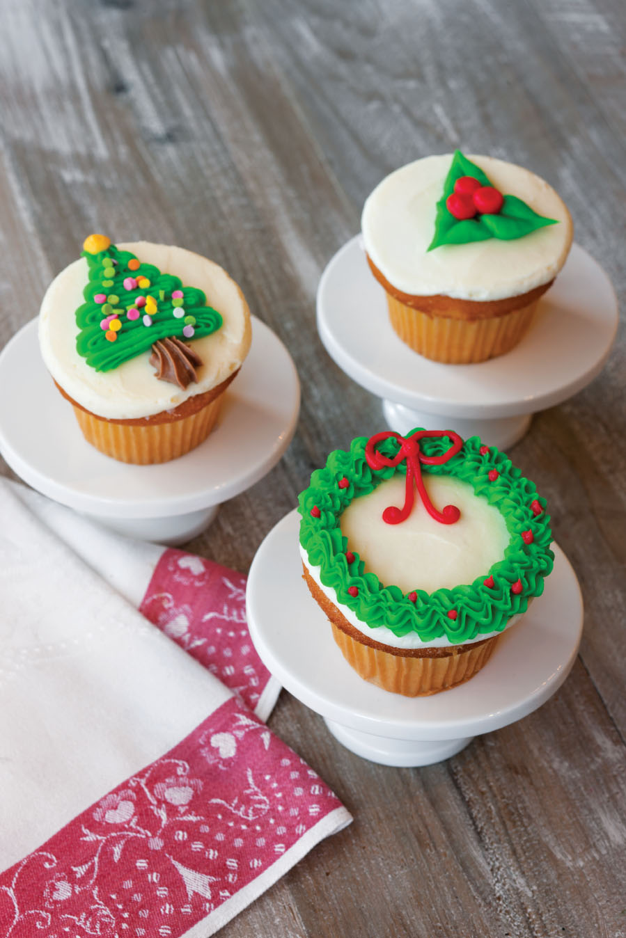 a cake with fruit on top of a wooden table