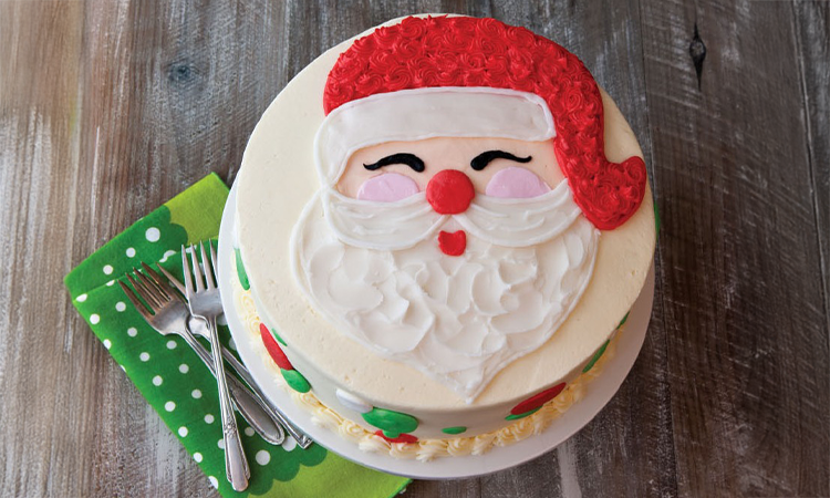 a cake sitting on top of a wooden table