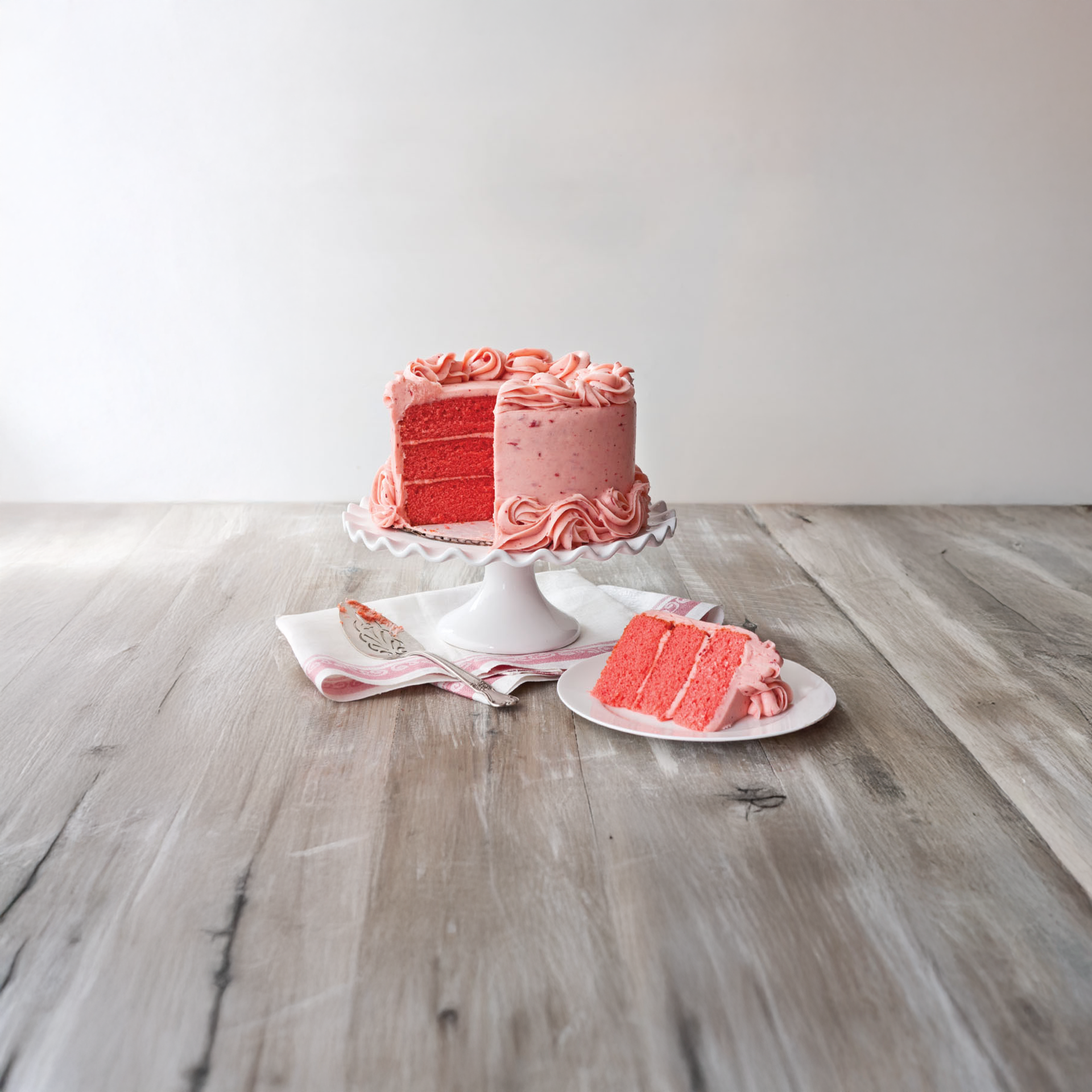a piece of cake sitting on top of a wooden table