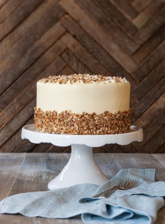 a piece of cake sitting on top of a wooden table