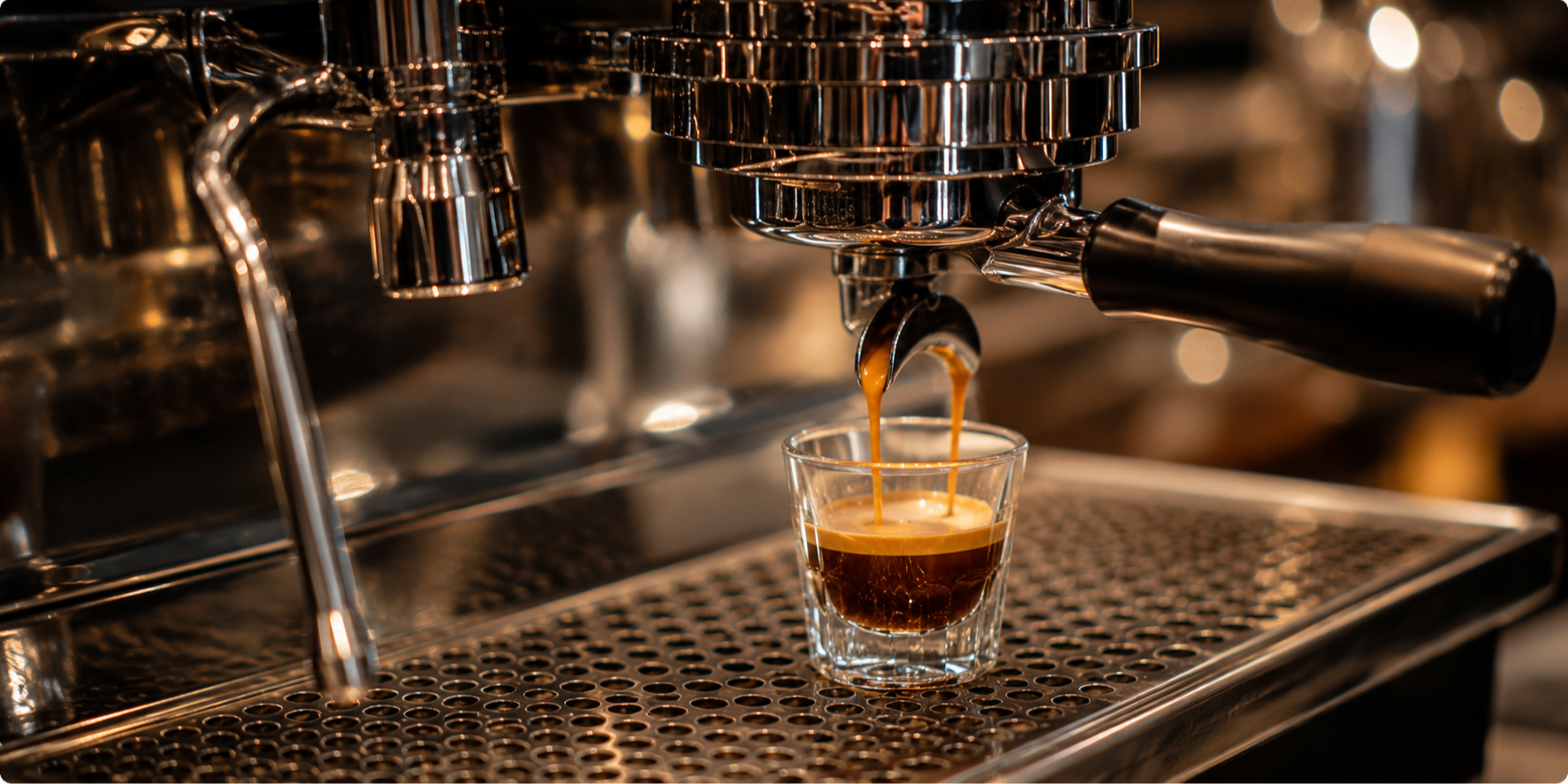 Espresso shot pouring from a professional espresso machine at Constellation coffee bar