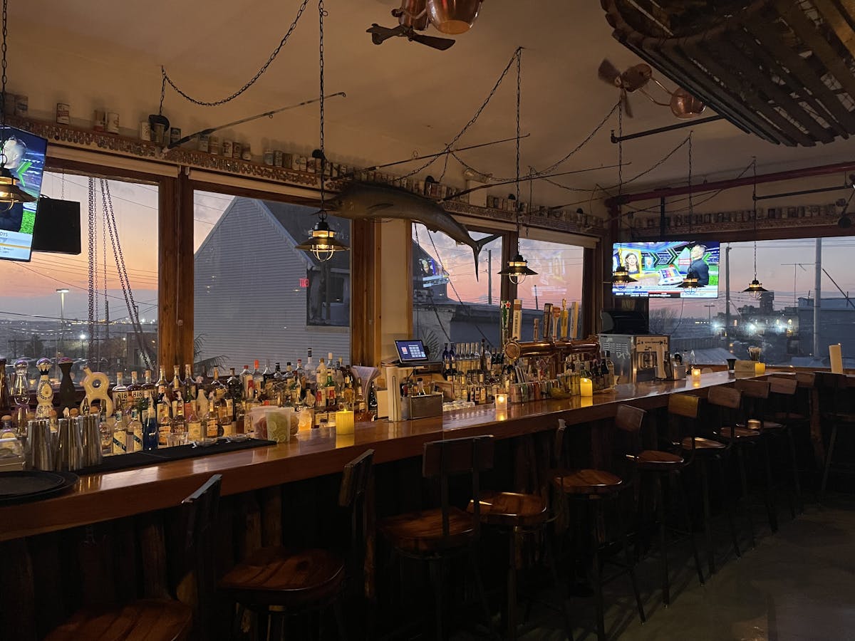 a group of people in a bar