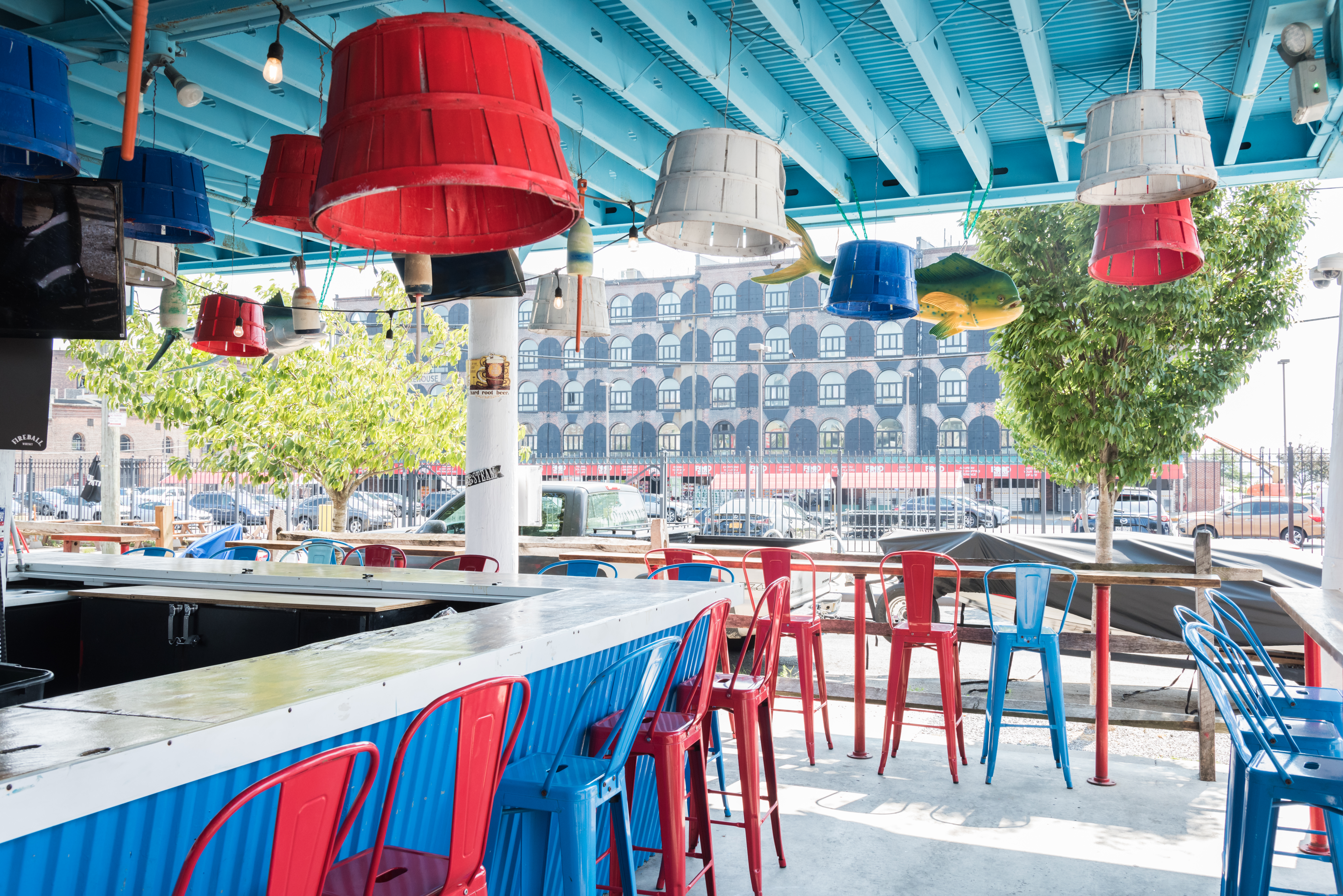 a group of people sitting at a dock