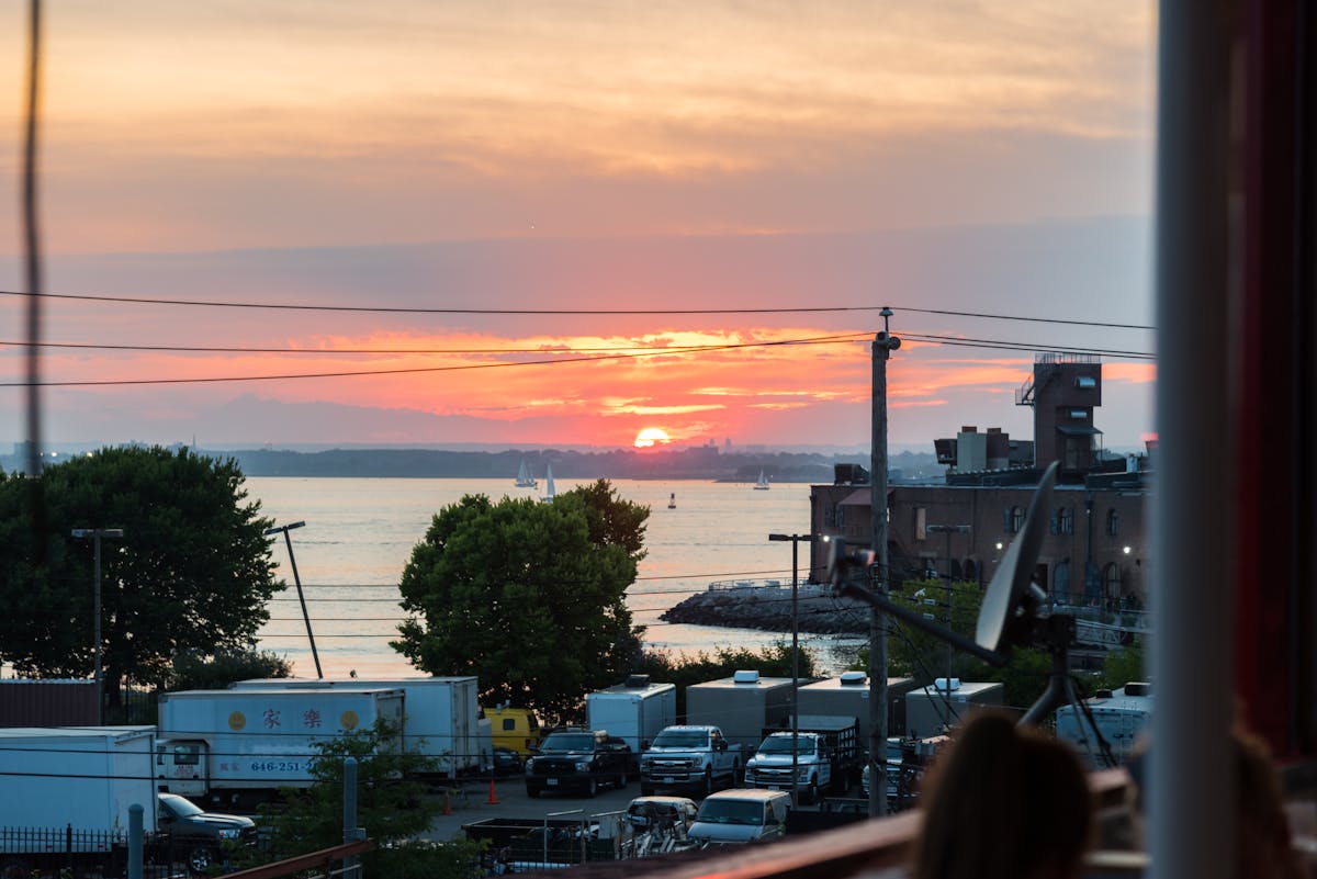 a view of a city at sunset