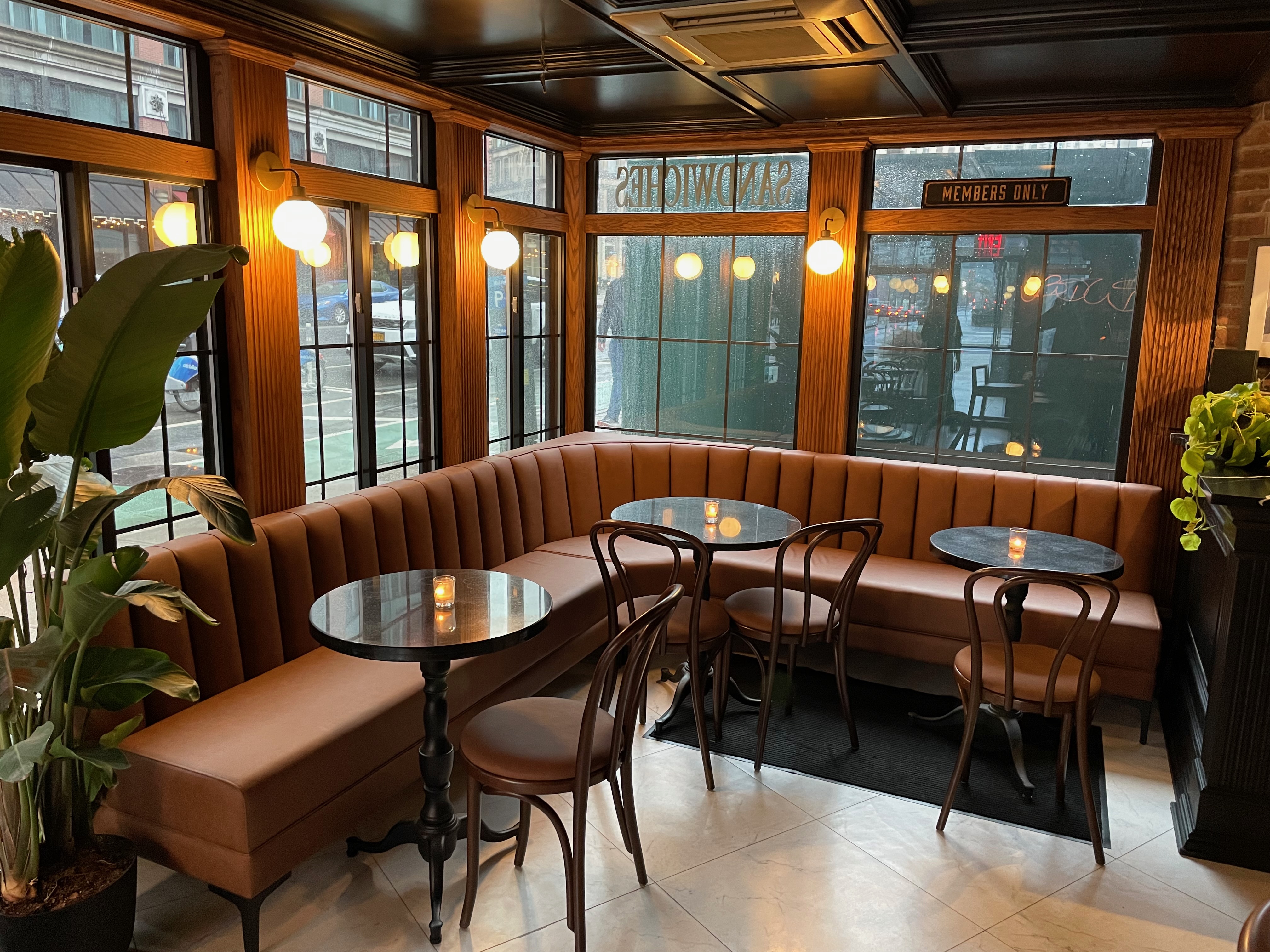 a room filled with furniture and a large window