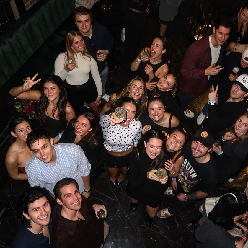 a group of people posing for a photo