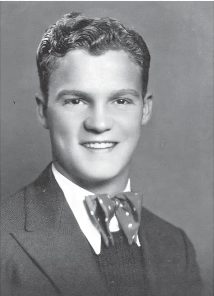 a vintage photo of a young man wearing a suit and tie