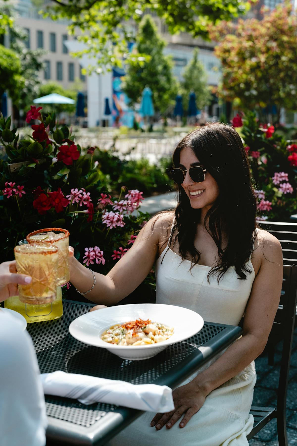 a woman with a cocktail