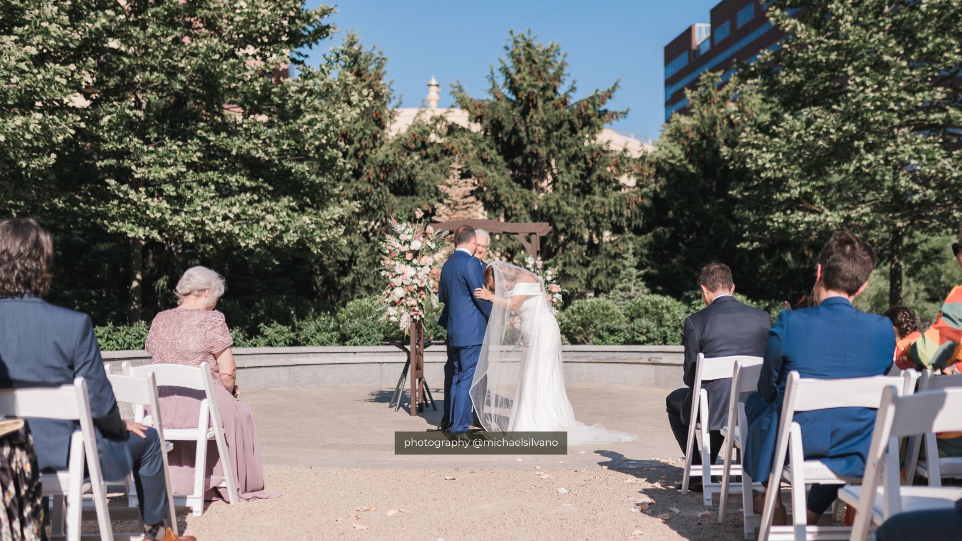 a group of people sitting in a chair