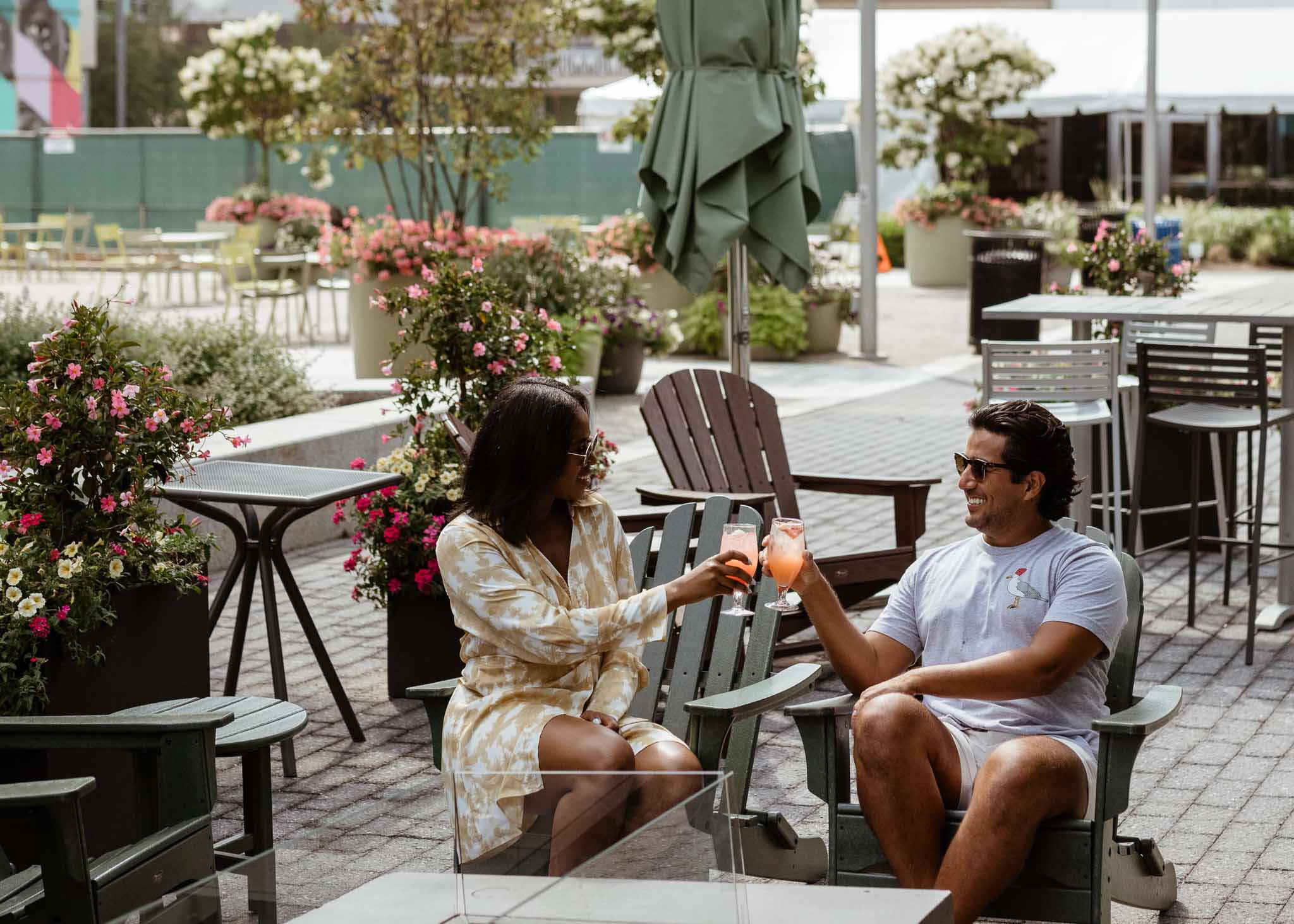 a man and a woman sitting on a bench