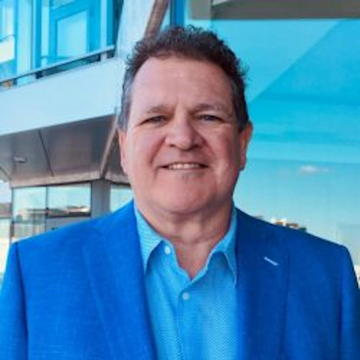 a man standing in front of a camara