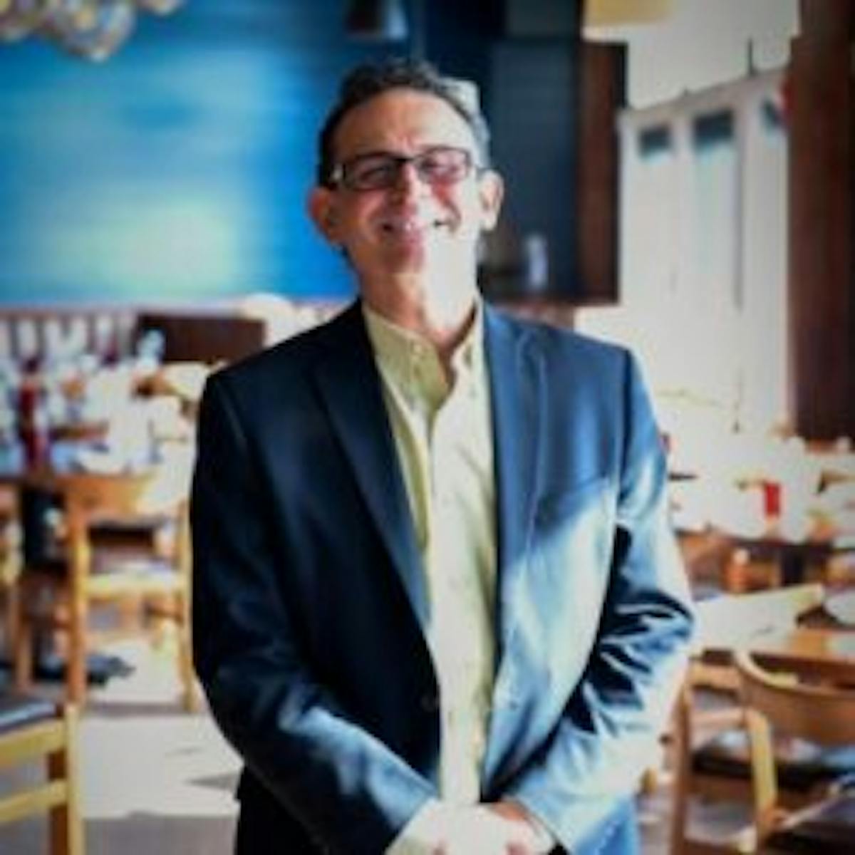 a man standing in front of a camara