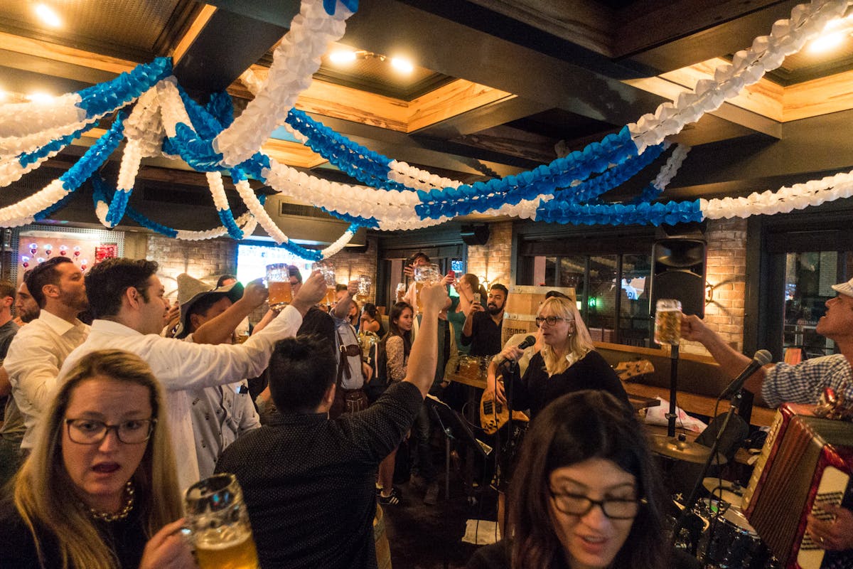 People Toasting Beer - OktoberFest 2016 at Treadwell Park