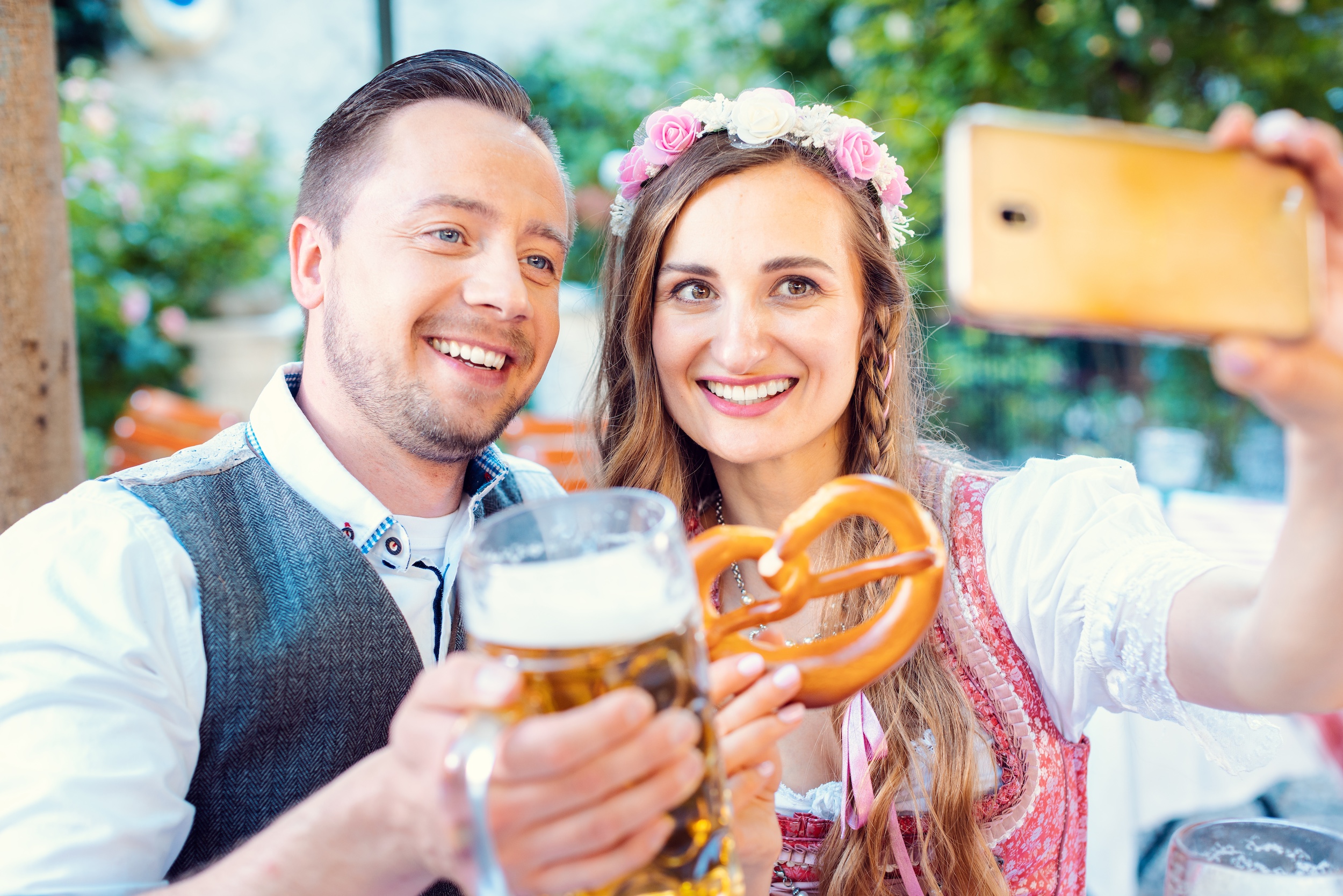 Crowd raising steins at Treadwell Park Oktoberfest.