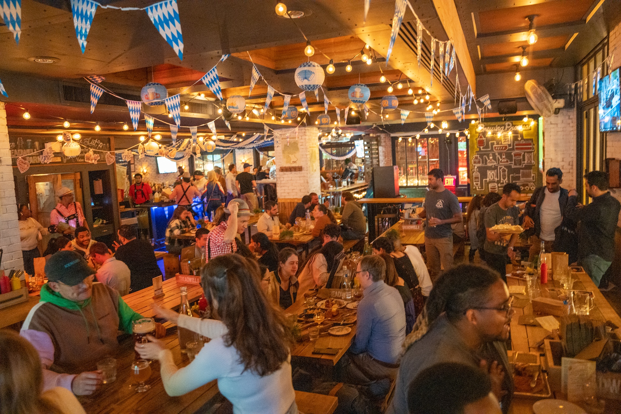 Guests enjoying steins at Treadwell Park Oktoberfest