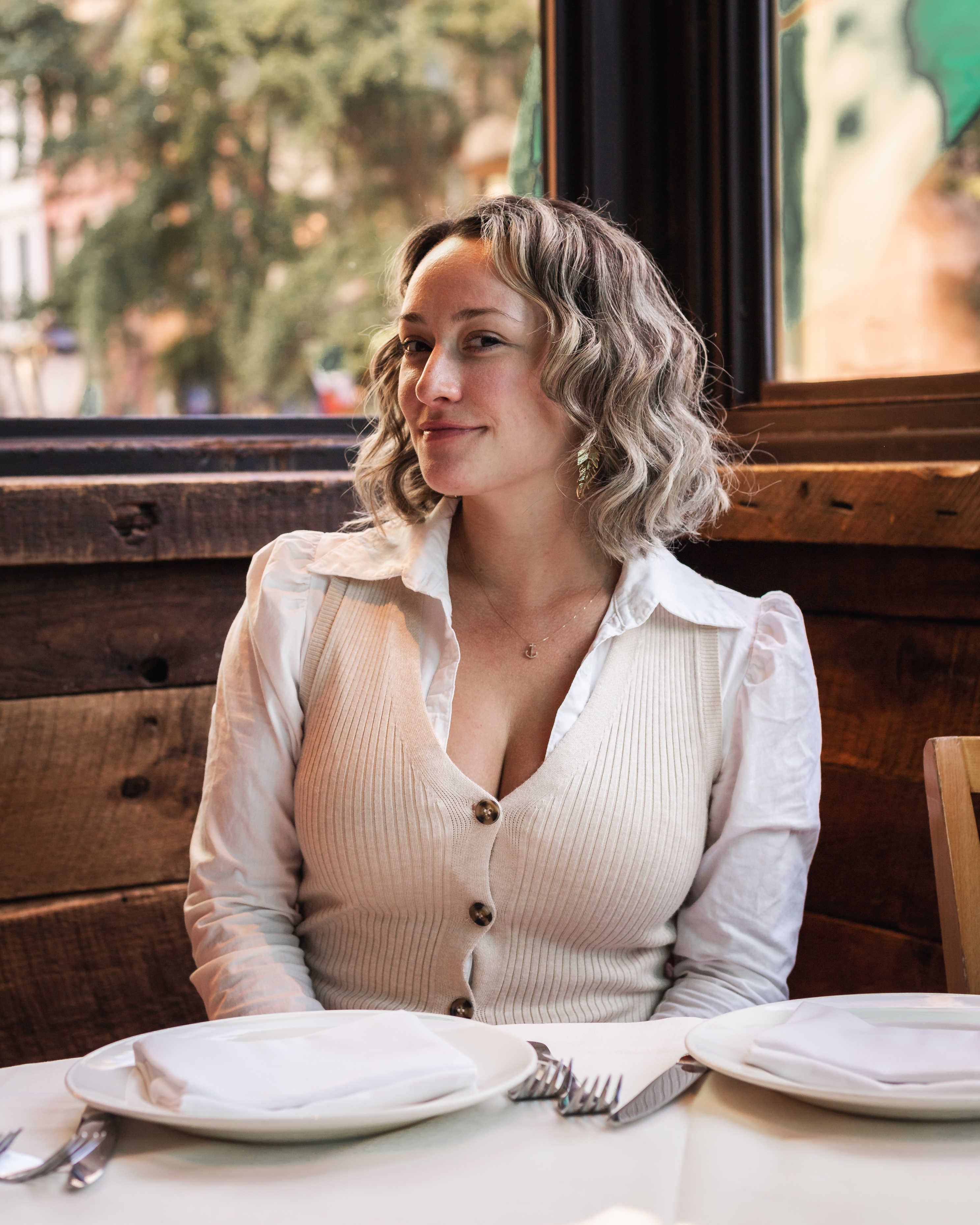 a woman sitting at a table