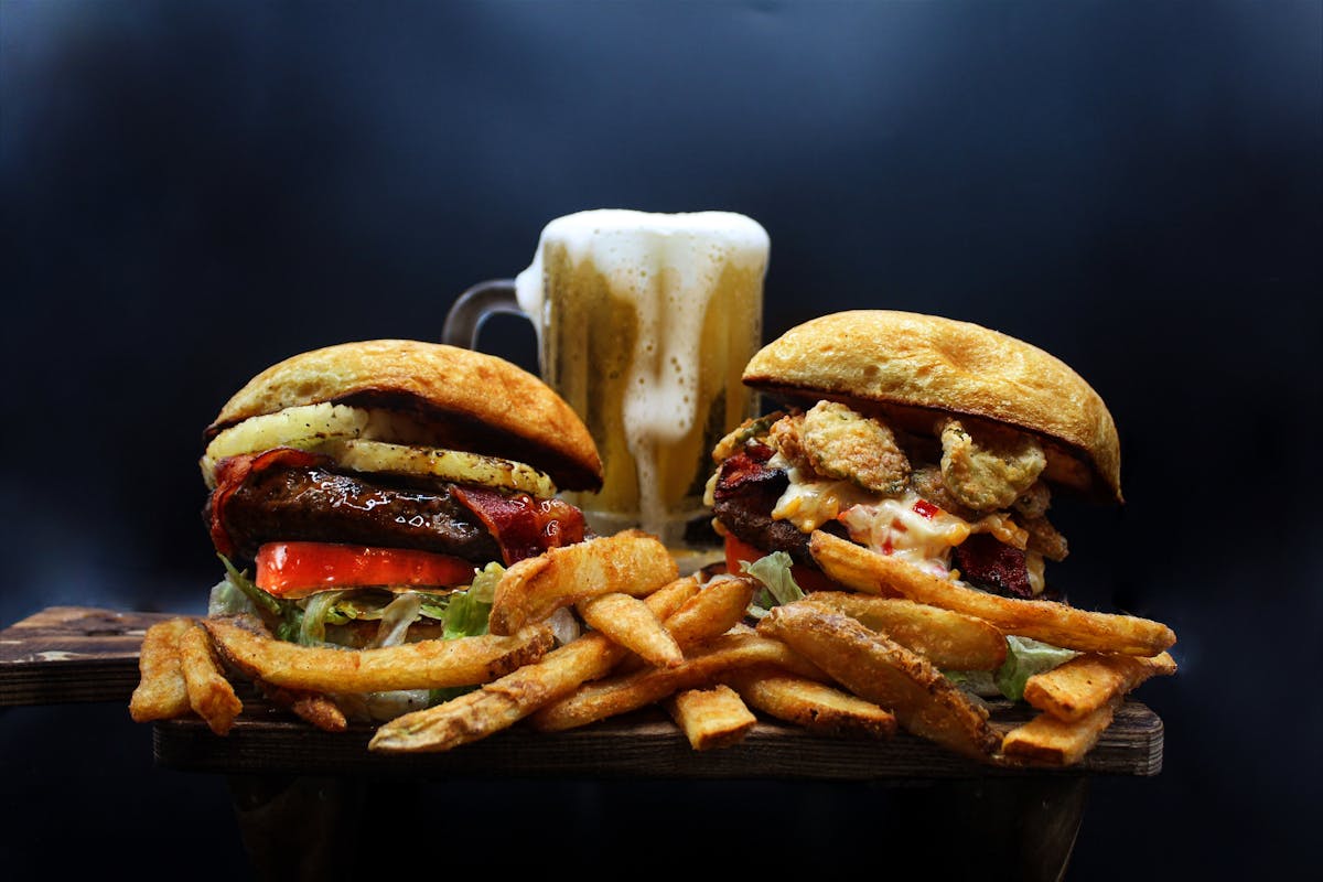 burgers and fries on a table