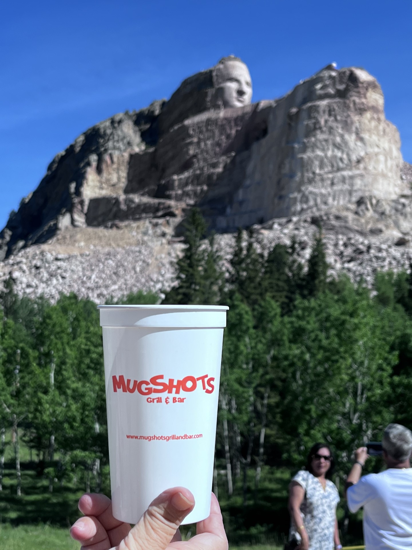 a person holding a cup