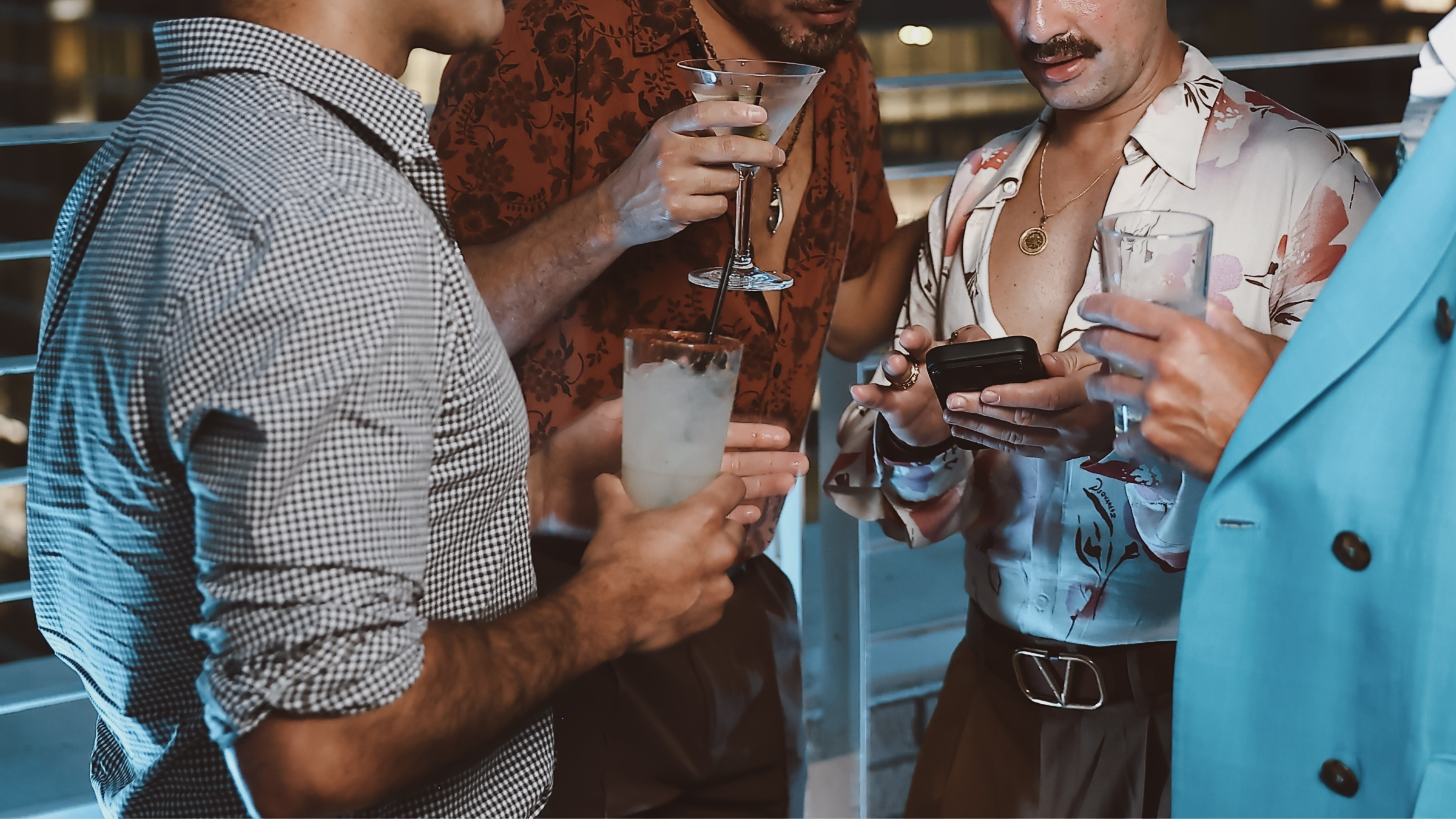 Men in tailored outfits drinking martinis at Z on 23 night lounge