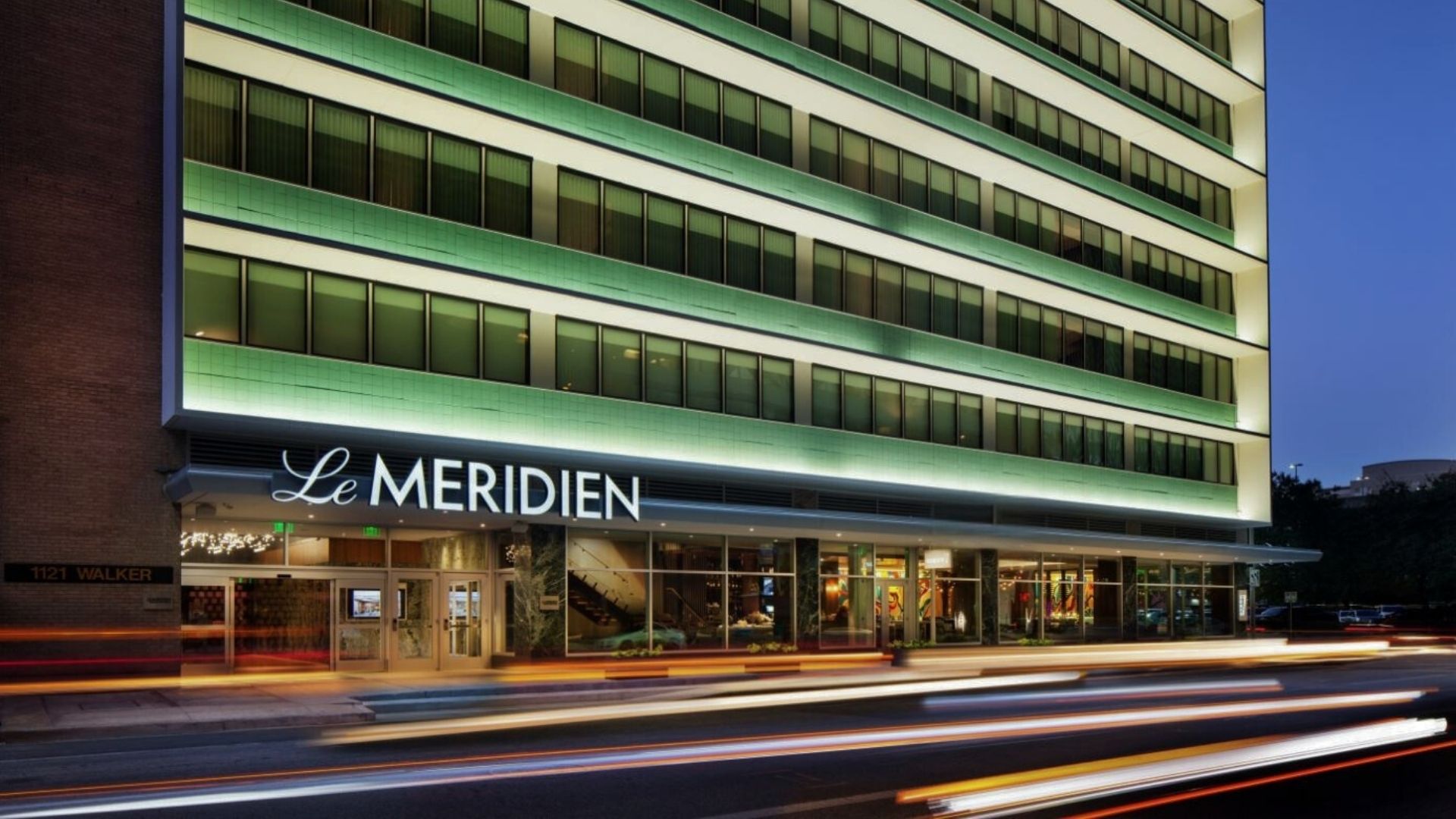 a building with lights on the front