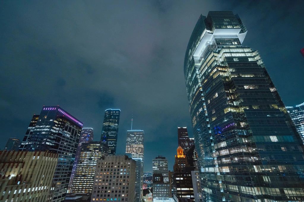 a view of a city with tall buildings in the background