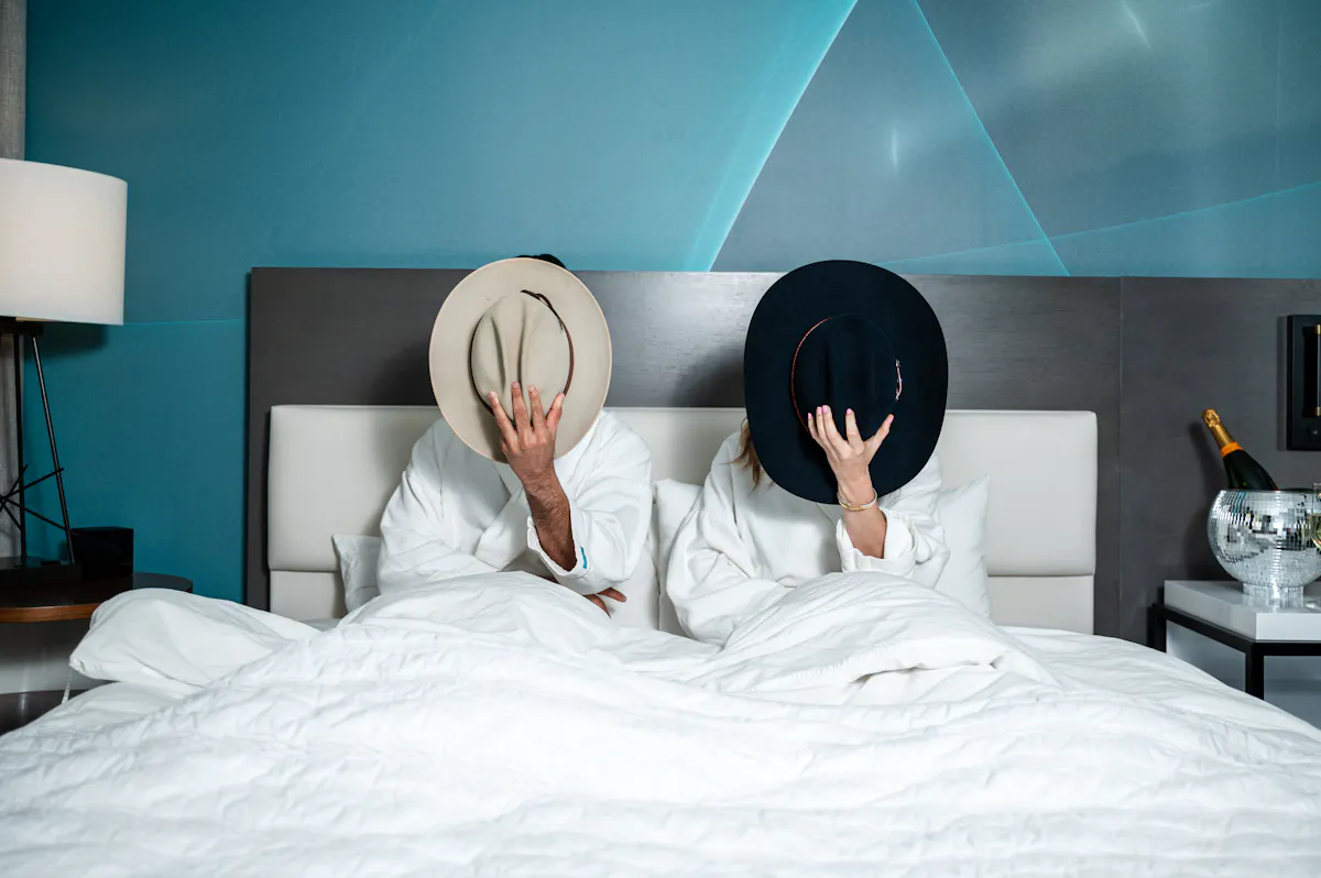 a person lying on a bed