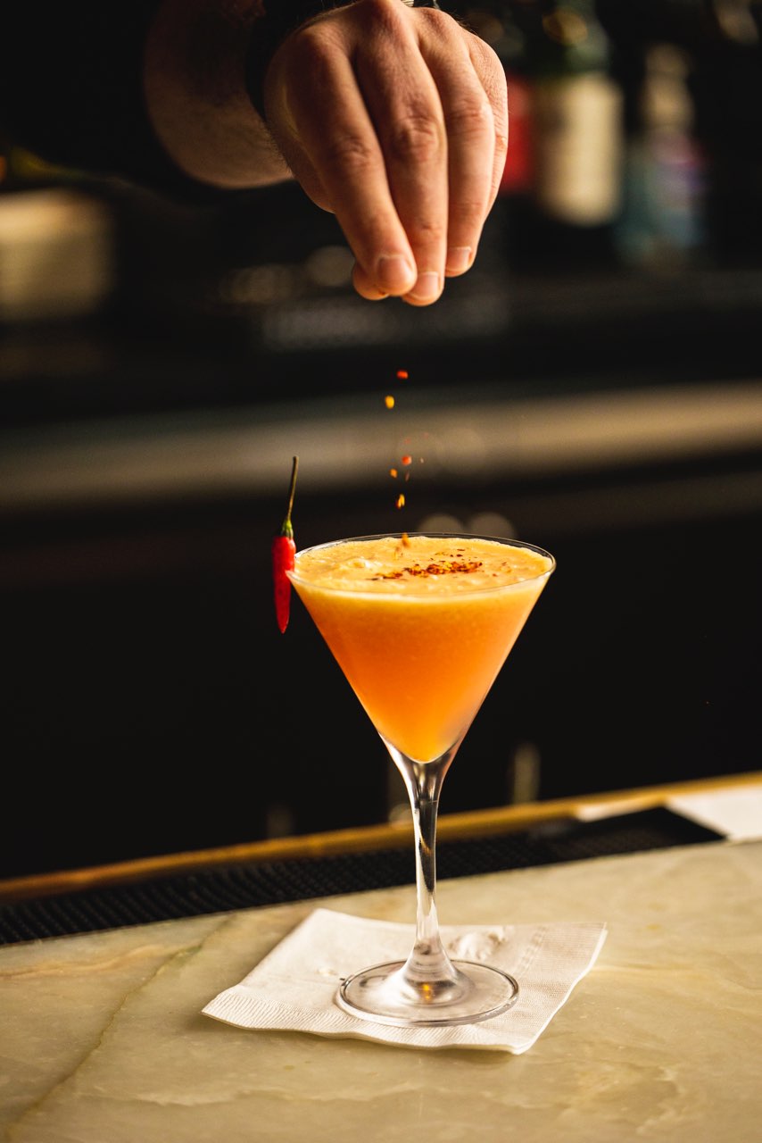 a glass of wine on a table