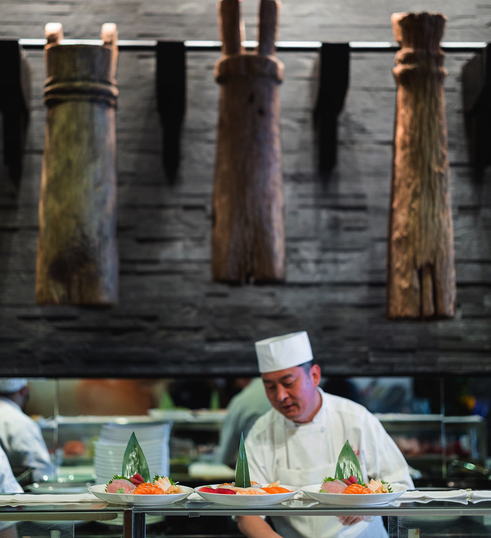a man sitting at a table with food