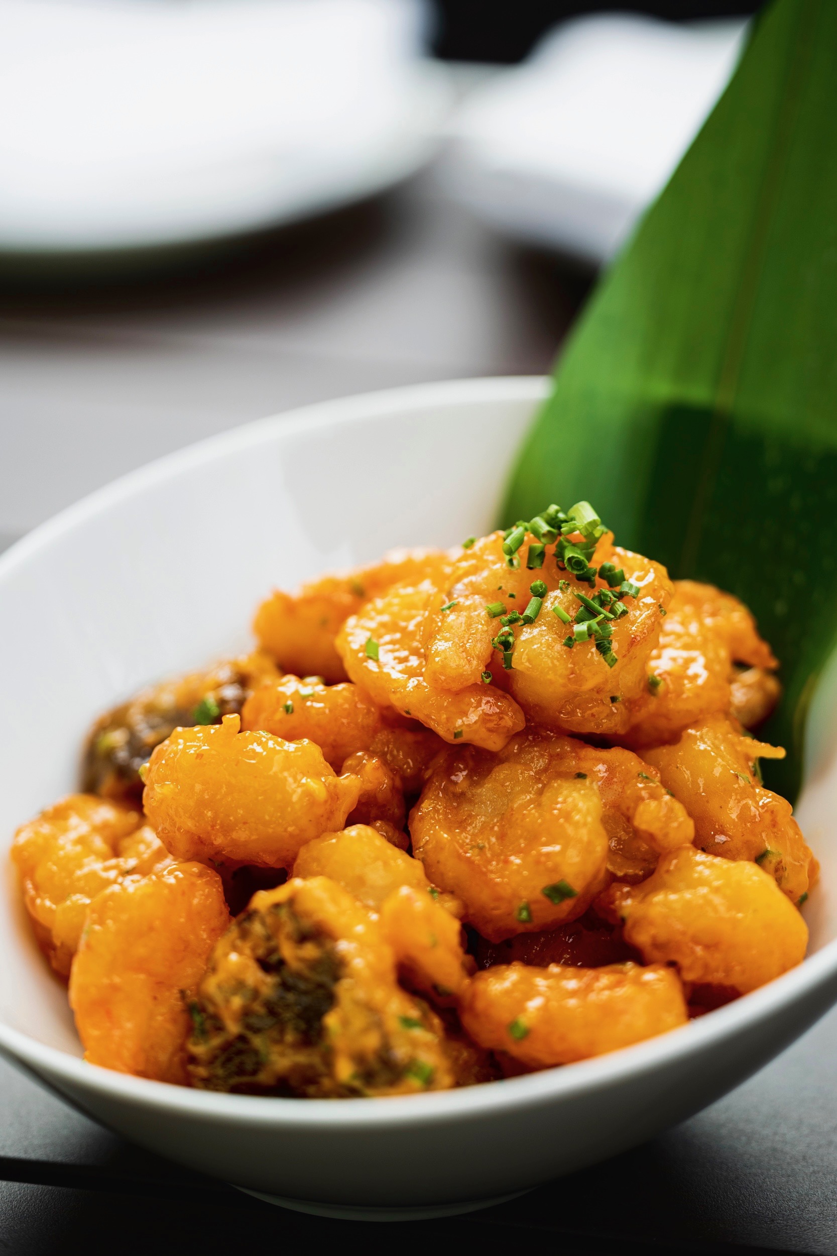 a close up of a bowl of food on a plate