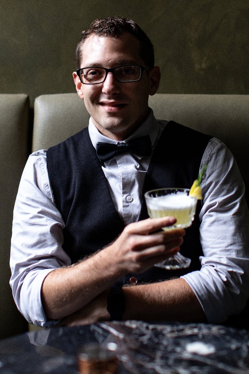 Ian Abriatis enjoying a craft made cocktail