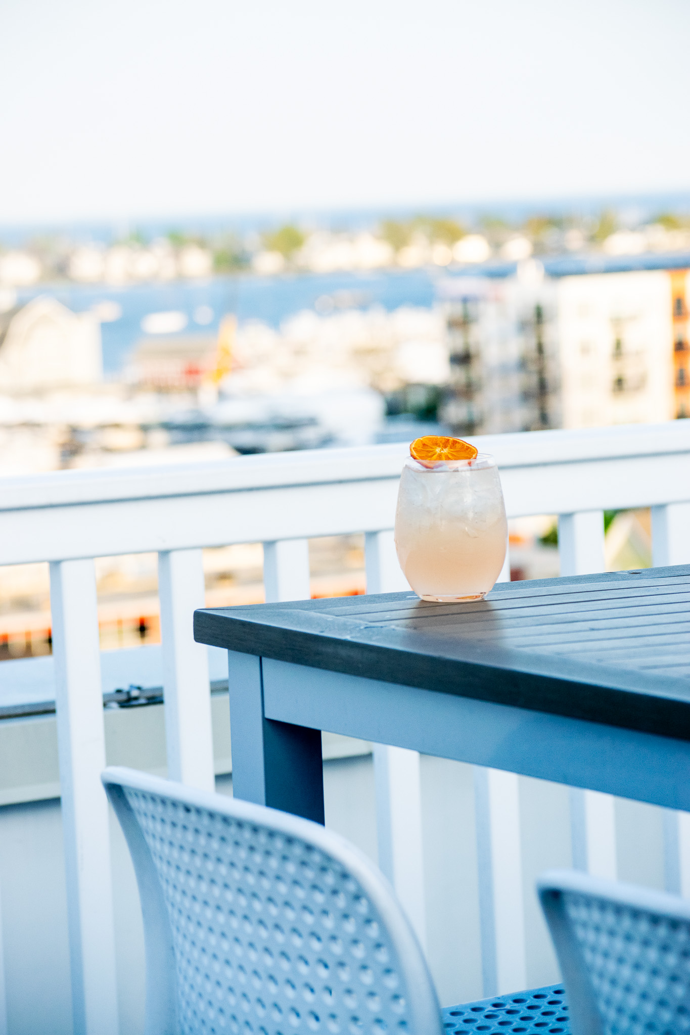 a bird sitting on top of a table