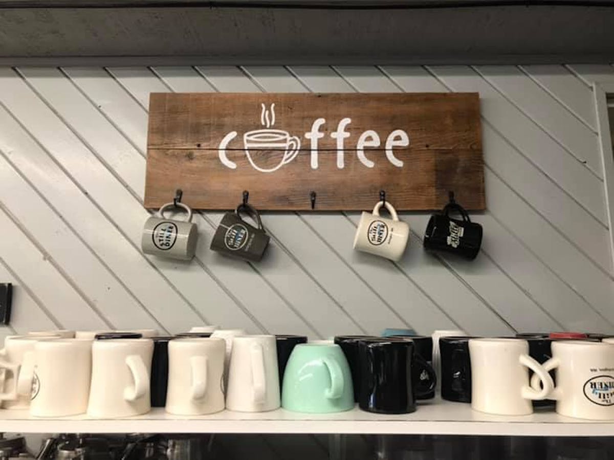 a bunch of coffee cups