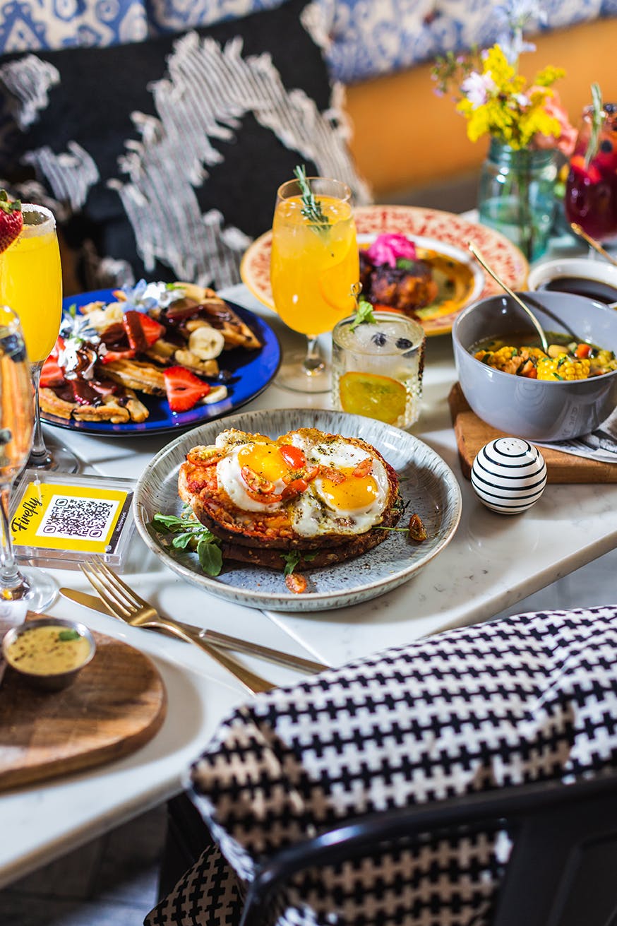 a table topped with plates of food on a plate