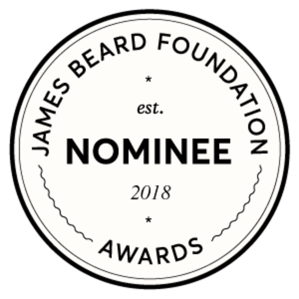 a white flower with a heart and a black background