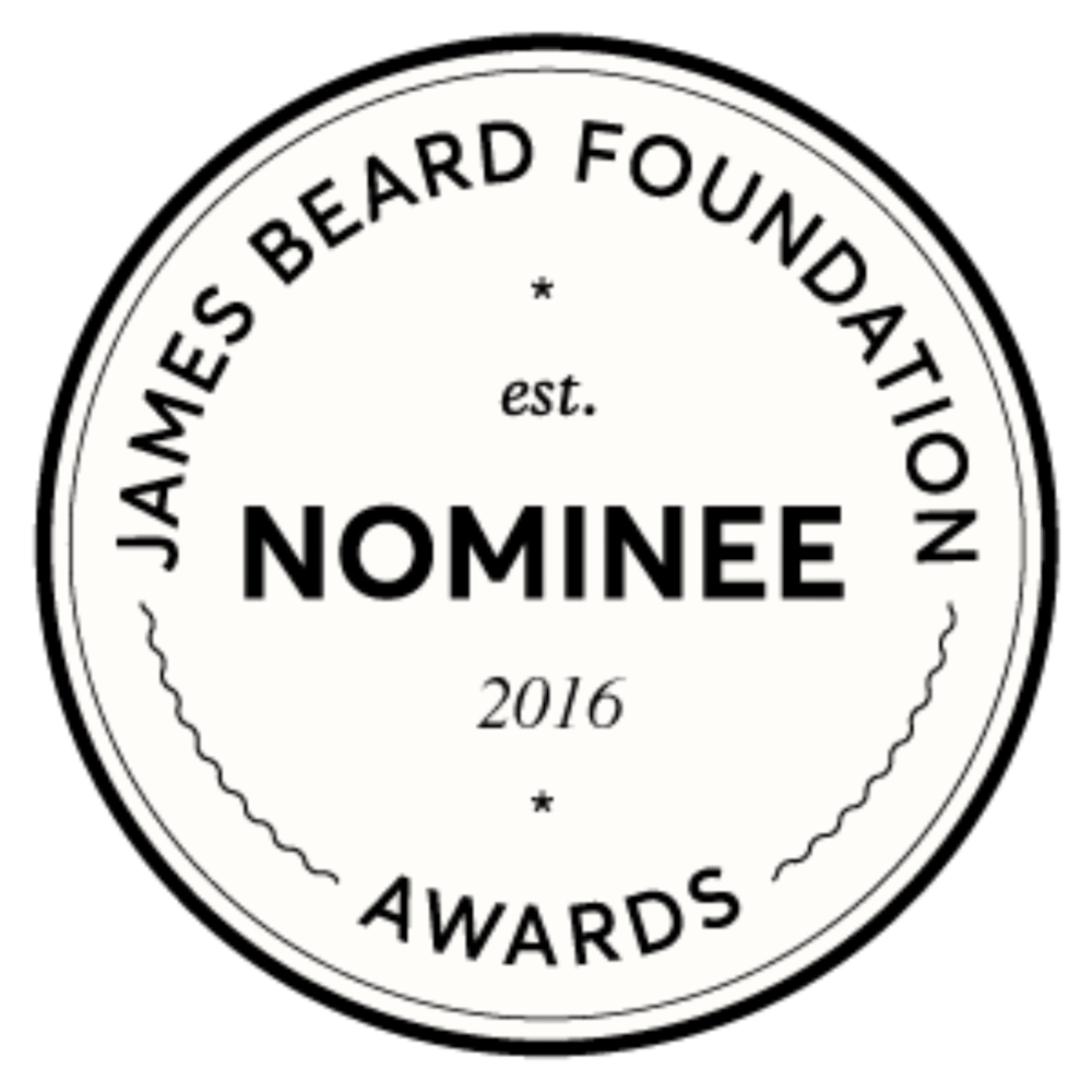 a white flower with a heart and a black background