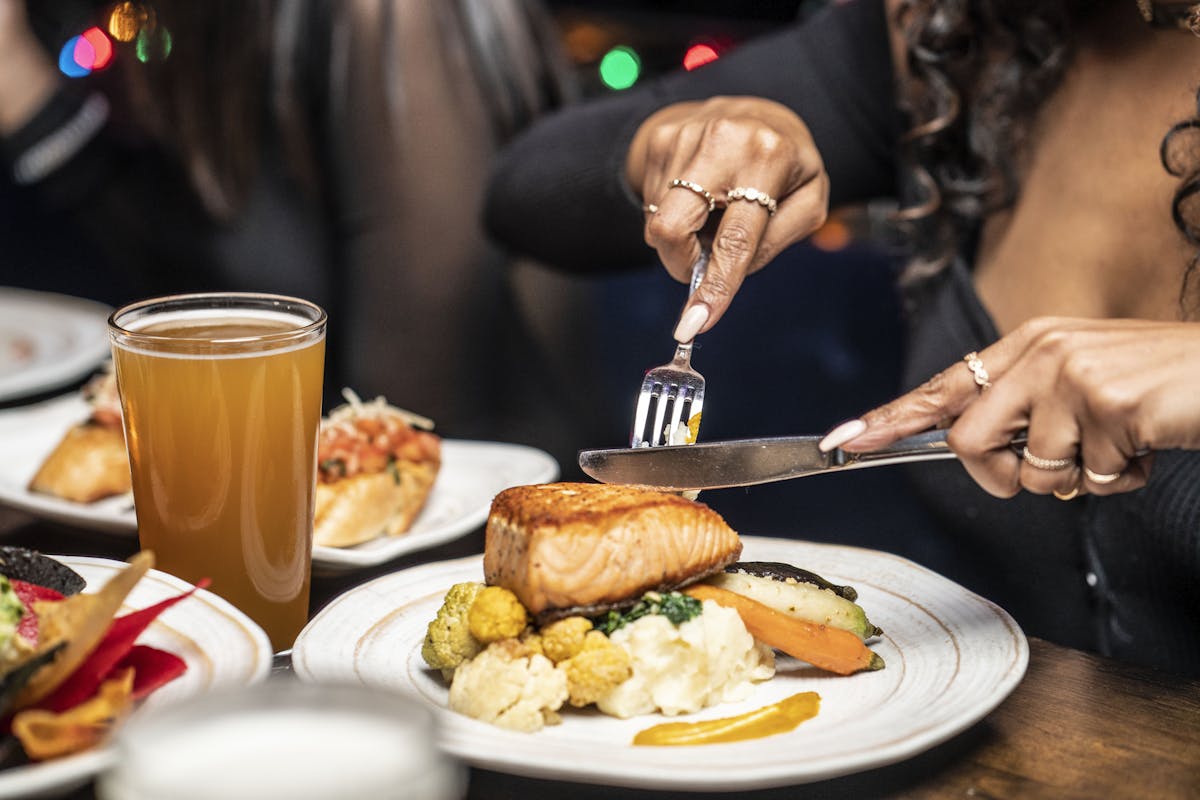 a person cutting food