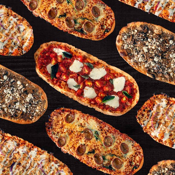a bunch of food sitting on a grill