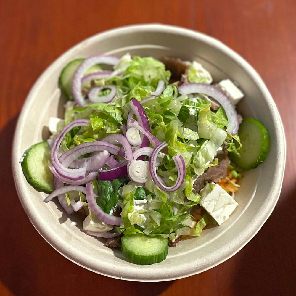 a bowl of salad on a plate