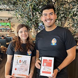 a group of people posing for the camera