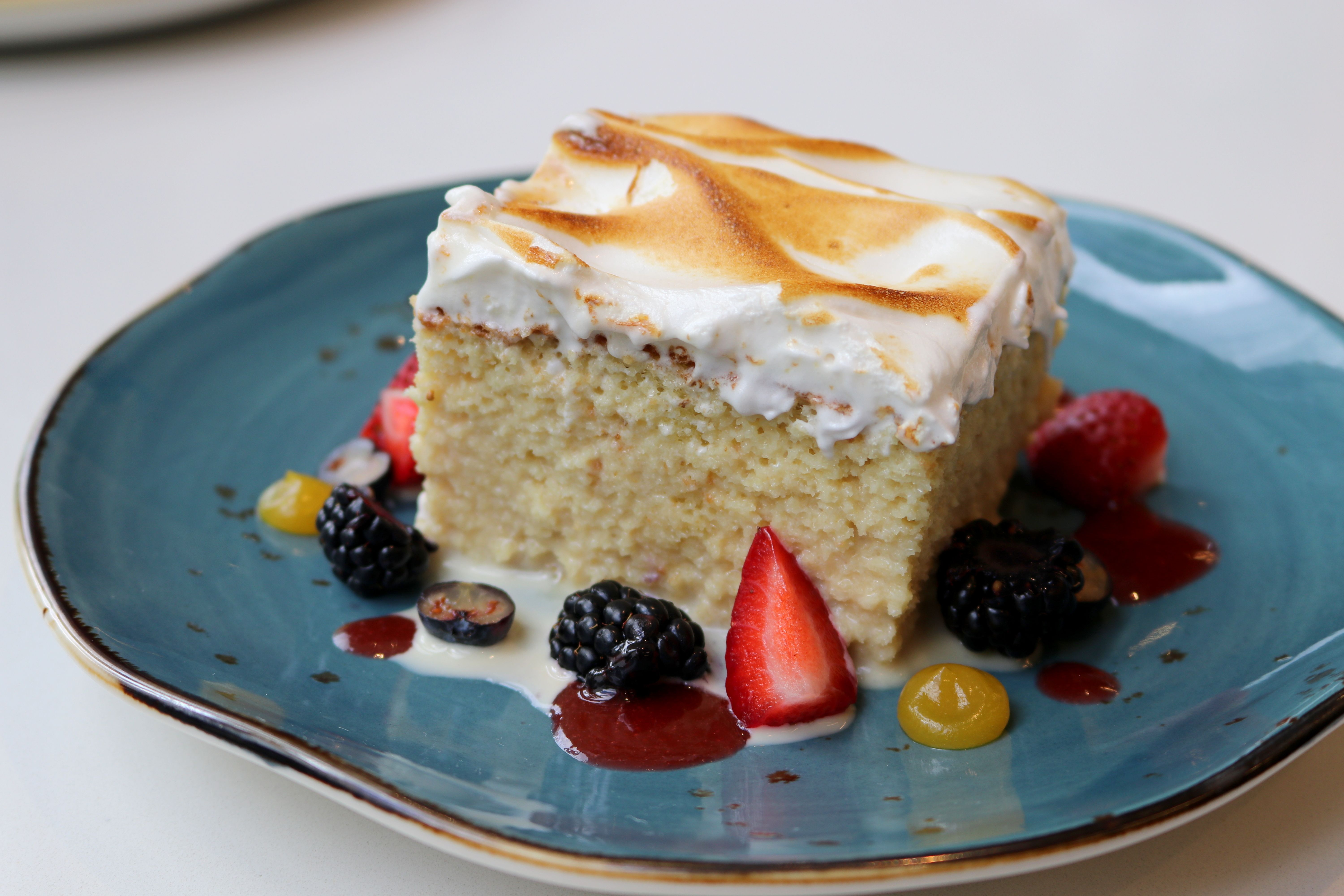 a piece of cake and ice cream on a plate