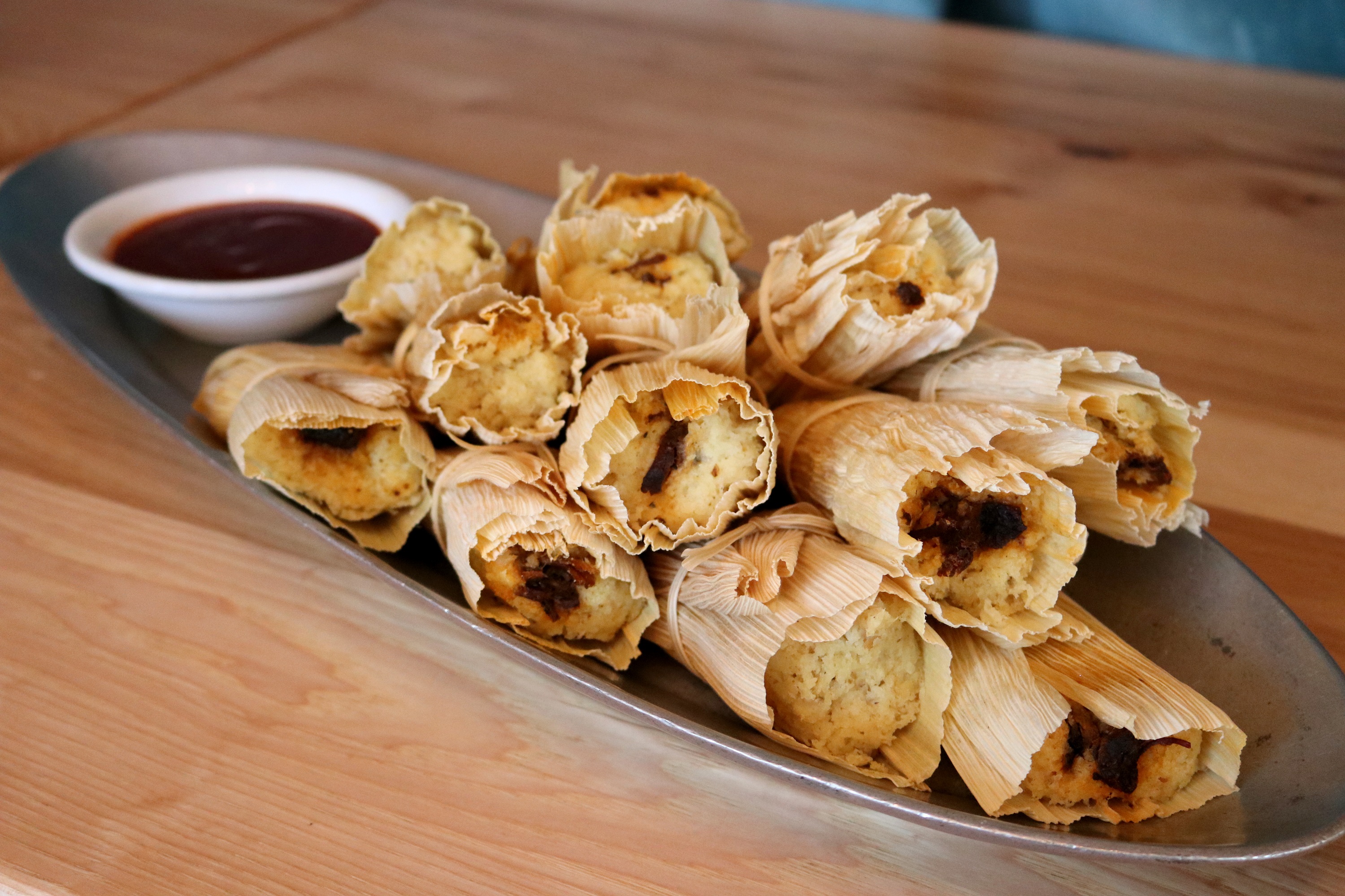 a plate of food on a wooden table