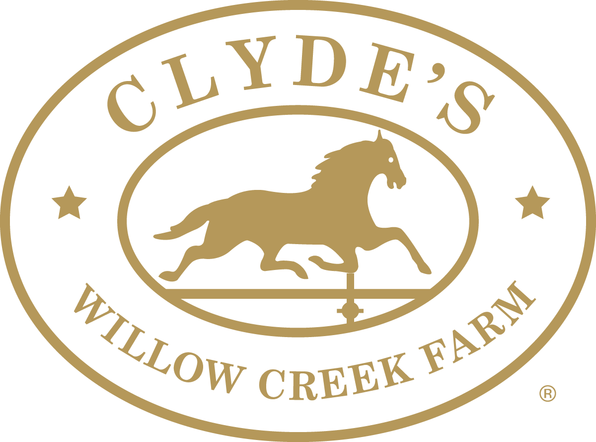 a gold logo with a horse and arrow