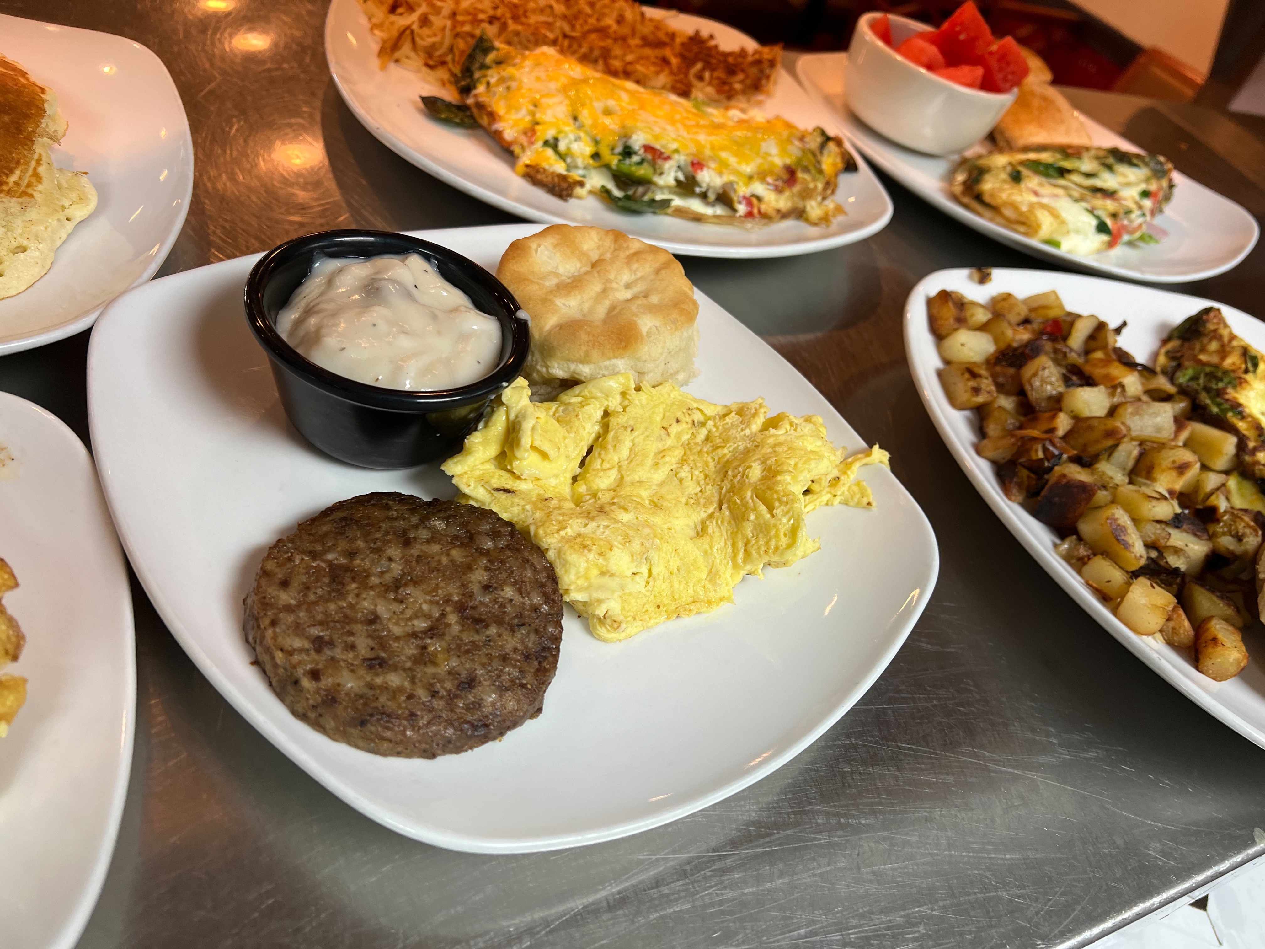 a bunch of food on a plate on a table