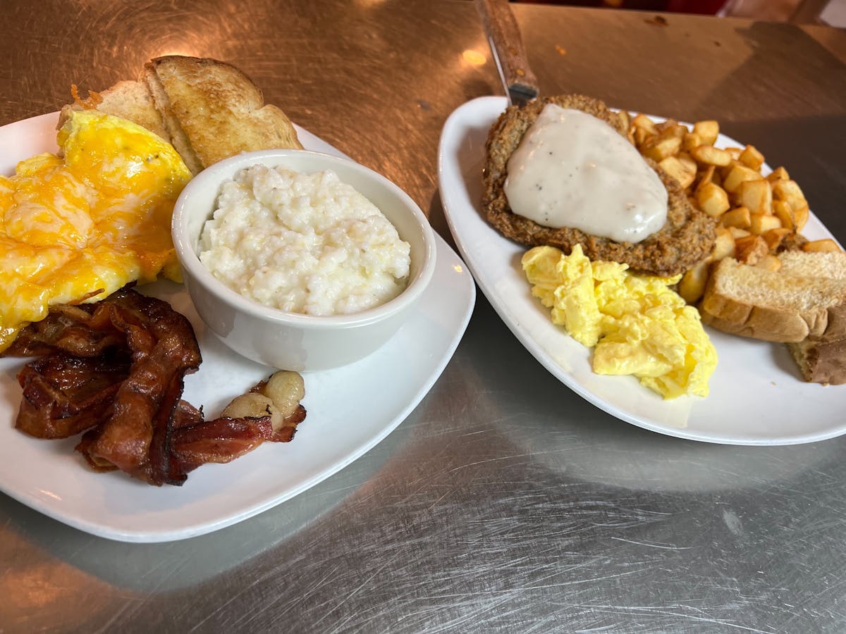 a plate of breakfast food on a table