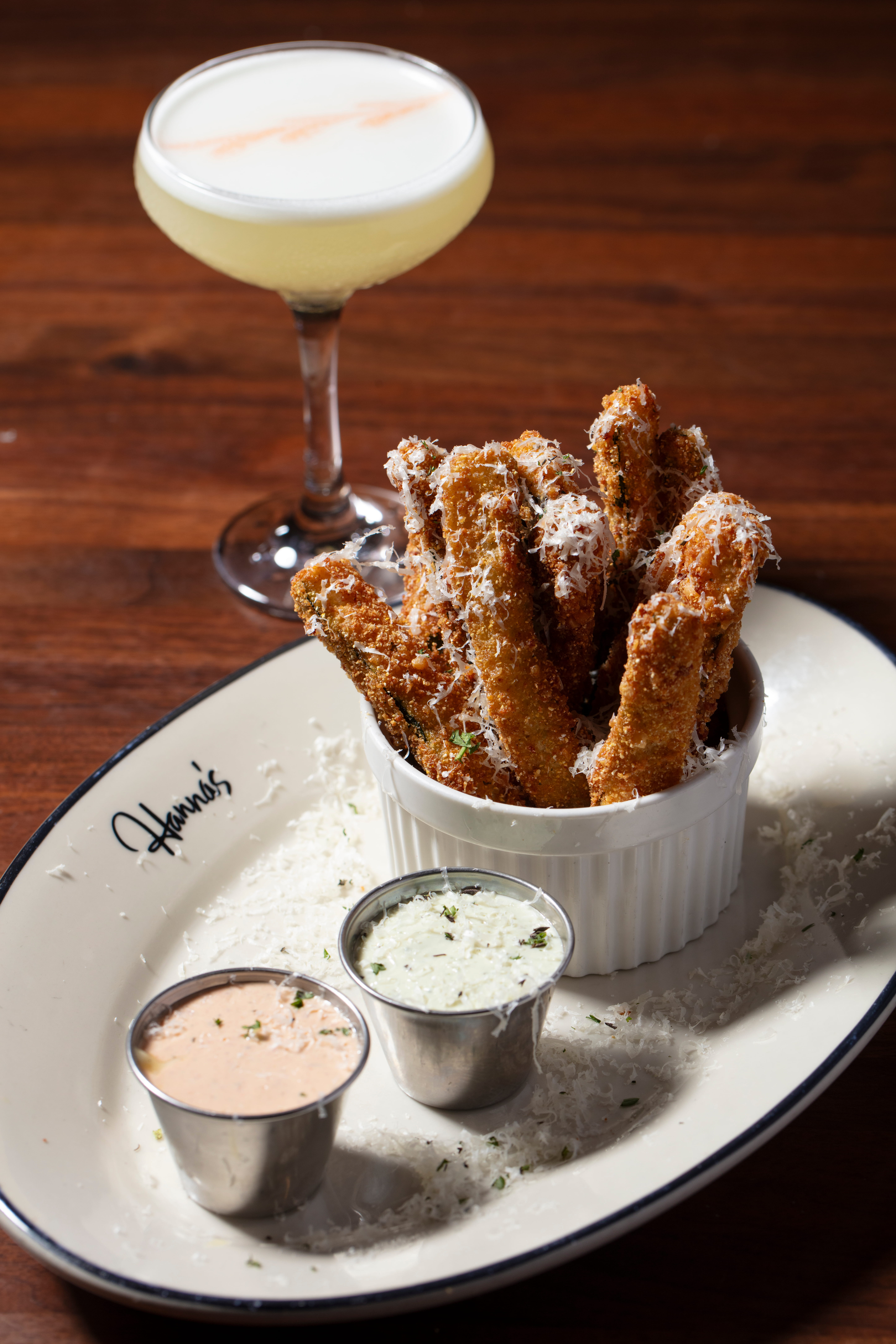 a plate of food with a drink