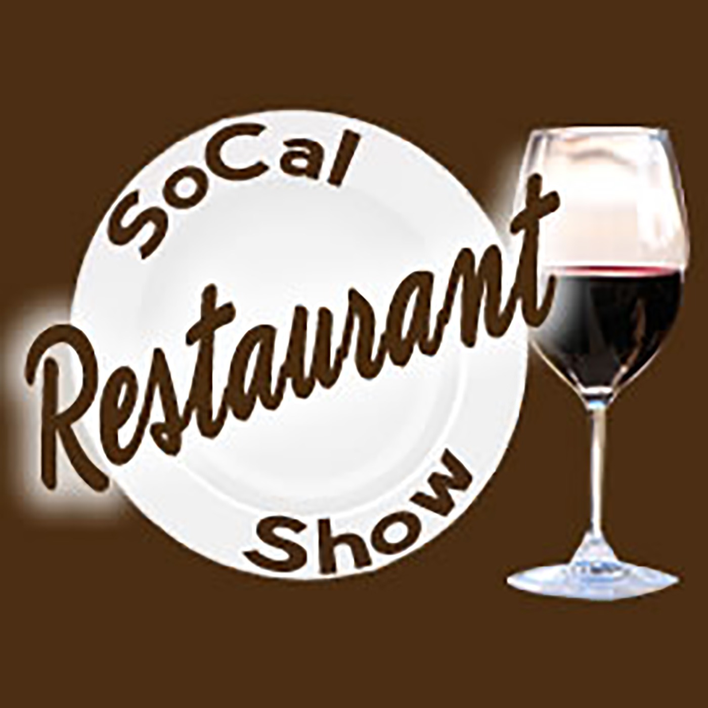 a glass of wine next to a plate