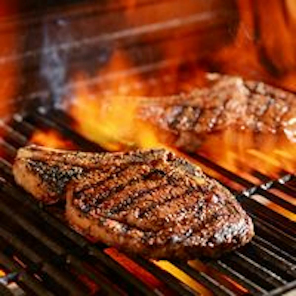 a close up of food on a grill